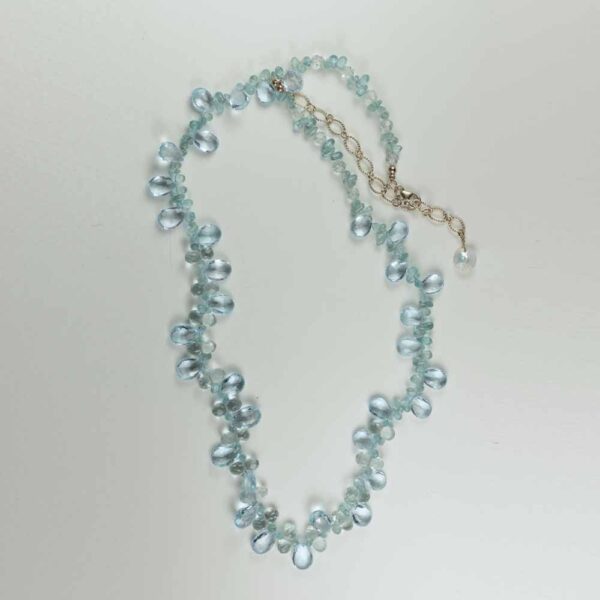 A necklace with blue beads on it